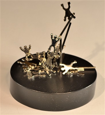 Metall akrobater på stark magnet